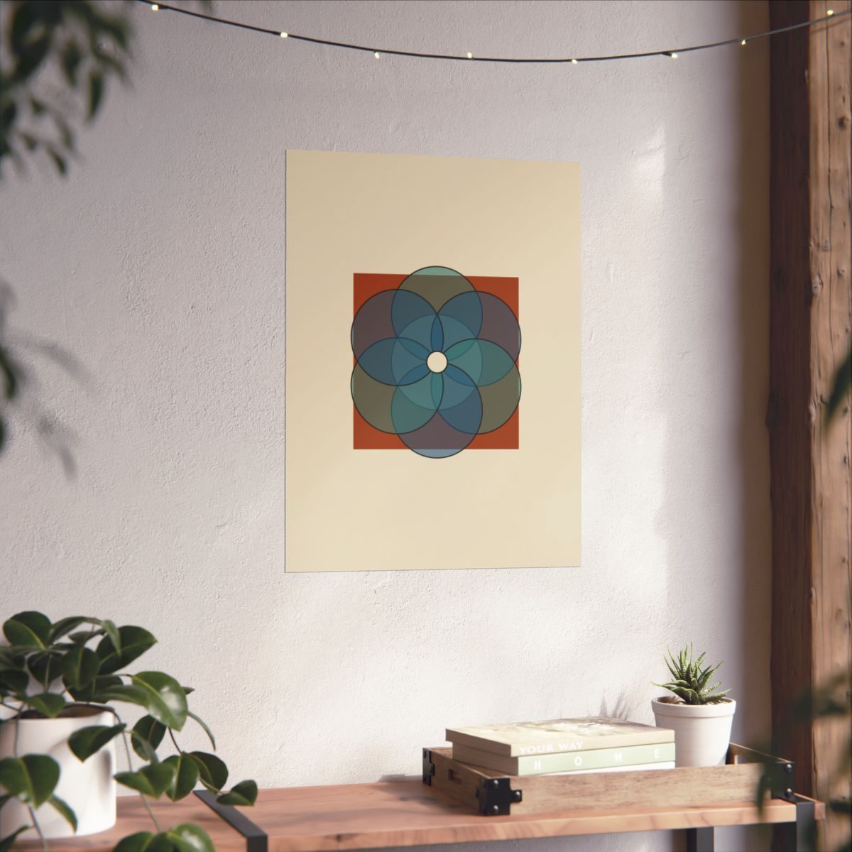 Breath of the Compass poster shown on a living-room wall above a wooden console with plants